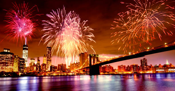 istock Fireworks over Brooklyn Bridge and One World Trade Center. 1423977045