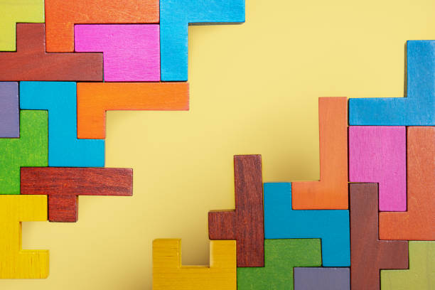 istock Abstract construction from wooden blocks. Concept of decision making process 1423977057