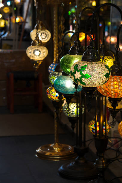 Multicolored old-style handmade Turkish lamps in a store in Istanbul stock photo