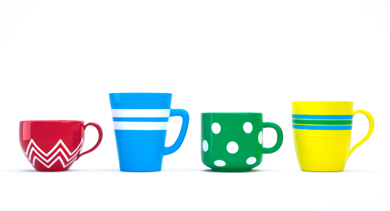 Funny colorful ceramic cups in a row isolated on white. Clipping paths. 3D image