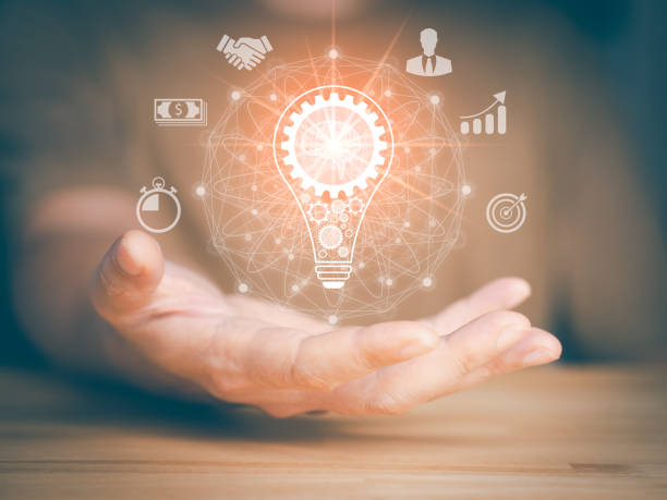 istock Hand hold light bulb, gears icon and brain inside. 1423981620