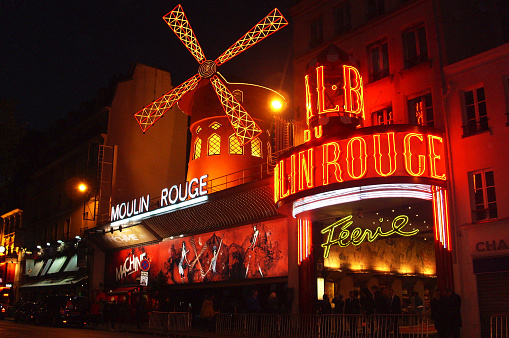 People Queue for a Night Show at The Moulin Rouge. Paris, France