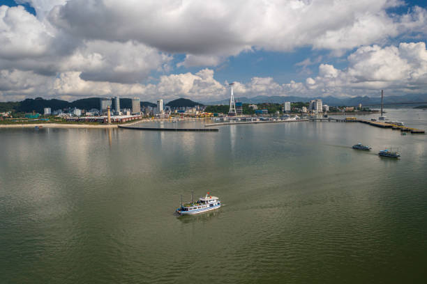Drone view of tour boat moving on Ha Long bay, Ha Long city, Quang Ninh province, north Vietnam