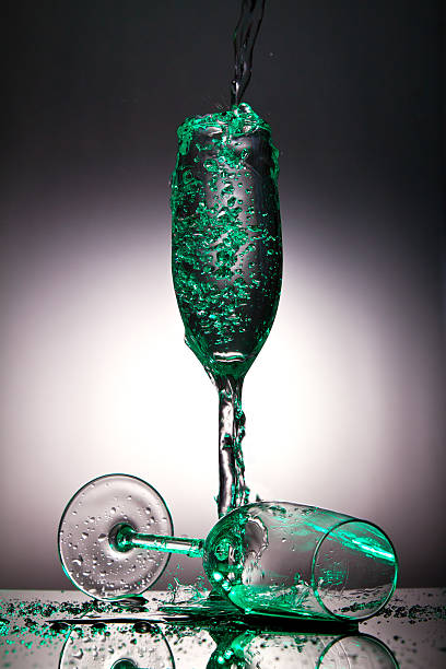 istock Champaigne glass overflowing with liquid 142398466