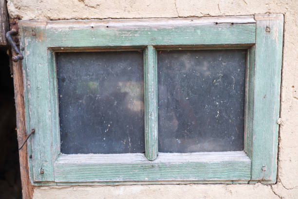 istock Old vintage window on the wall 1423985518