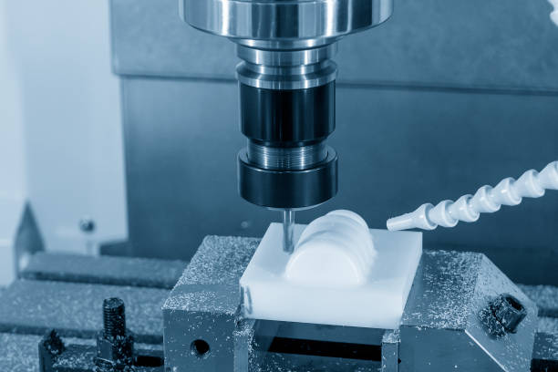 istock The CNC milling machine cutting the plastic material parts by solid ball endmill tool. 1423986320