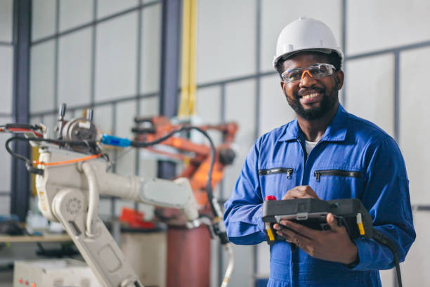 Professional Engineer African-American smiles and looking at camera stock photo