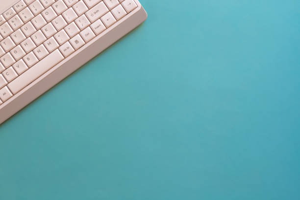 istock Abstract business template with white keyboard, top view, copy space. Close-up view. 1423990880