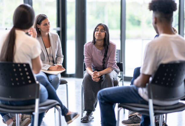 istock Young adults meet for emotional support 1423992612