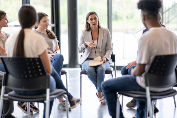 istock Young adults meet for emotional support 1423992621