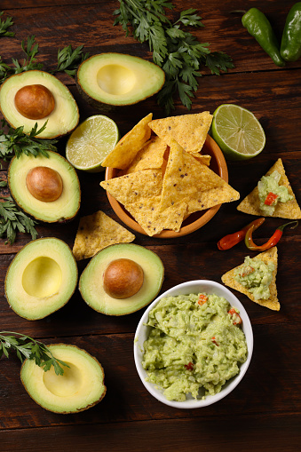Guacamole with chips table top food shot