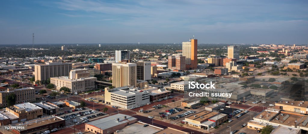 Downtown Lubbock Aerial Drone Summer Morning Downtown Lubbock, Texas, is shown from an aerial view on a summer morning.  Texas Tech University is in the distant background. Lubbock Stock Photo