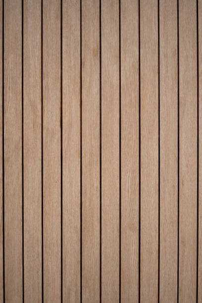 istock Arranged pattern  brown wooden planks board background makes you feel warm and natural. 1423995652