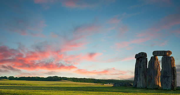Panoramic view of Stonehenge against a purple blue sky with room for your text