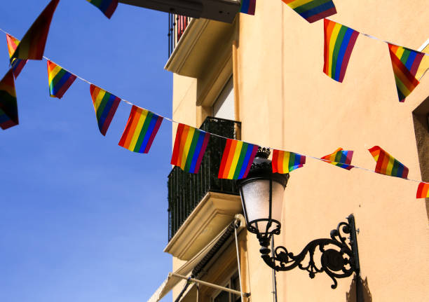 istock Streets and facades adorned with rainbow flags in Benidorm 1424004514