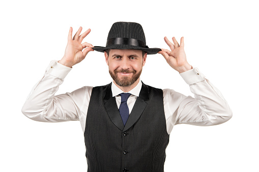 happy mature guy in formalwear and retro hat isolated on white background, elegance.
