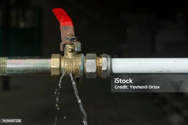 Crack On The Water Tap And A Water Leak After The Spring Frost Stock Photo - Download Image Now
