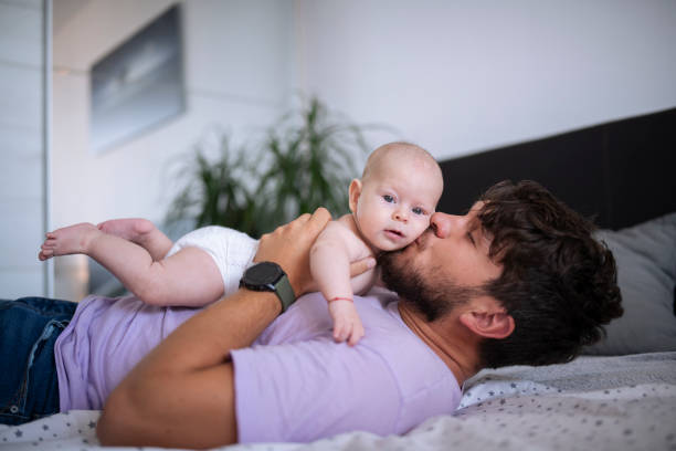 istock Pure love between father and baby son. 1424008216