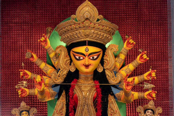istock Goddess Durga devi idol decorated at puja pandal in Kolkata, West Bengal, India. Durga Puja is biggest religious festival of Hinduism and is now celebrated worldwide. 1424008428