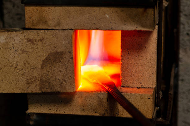 istock The process of heating metal in a forge. Home forge. Heating metal for forging. 1424009235