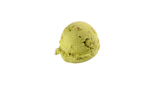 Delicious pistachio ice cream scoop, isolated on white