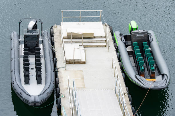 Cannes, France - April 2019:  Fuel pump on the harbourside in the Port Pierre Canto marina in Cannes. A speedboat is passing in the background.