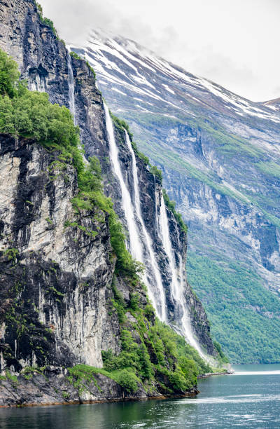 Geirangerfjord near Hellesylt in Norway.  This is the famous seven sisters waterfall one of the highest in Norway.