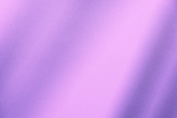 Light pale pink purple silk satin fabric. Lilac lavender abstract elegant background with space for design. Color gradient. Lines.