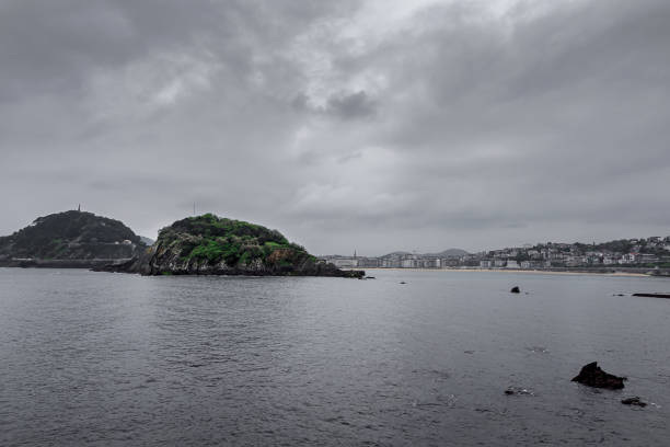 La Concha beach in San Sebastian, Basque Country with a cloudy day. Cantabrian Sea