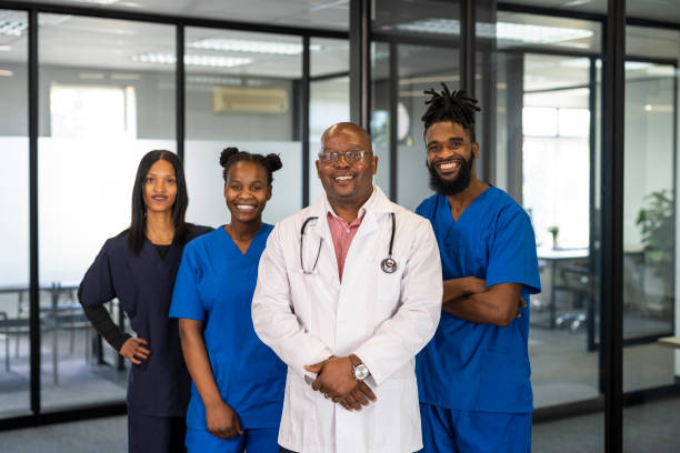 istock Cheerful confident medical team in lobby 1424022830