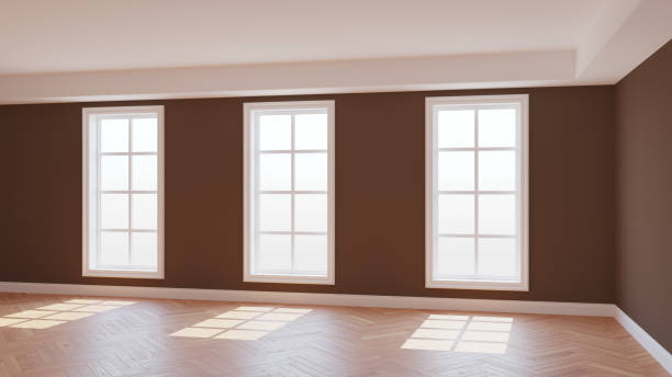 istock Sunny Interior with Brown Walls, Three Large Windows, Light Glossy Parquet 1424026295