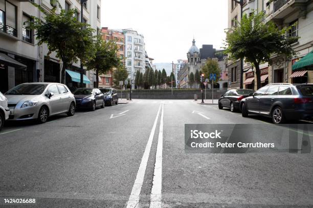 Quiet Spanish City Backstreet Viewed From The Centre Of The Road Stock Photo - Download Image Now