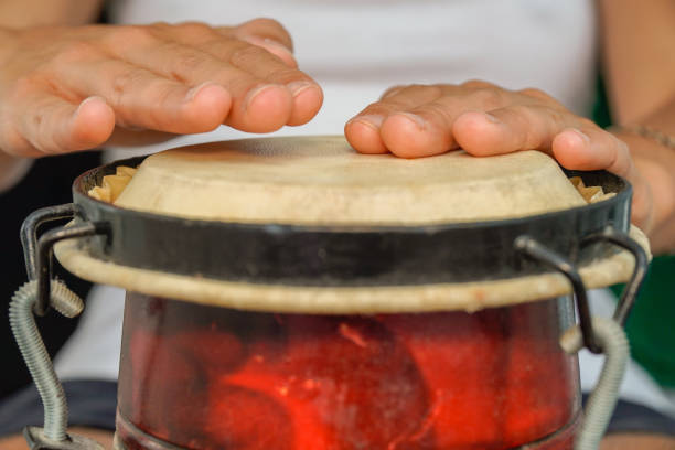 istock Female hands play an African drum. 1424026807