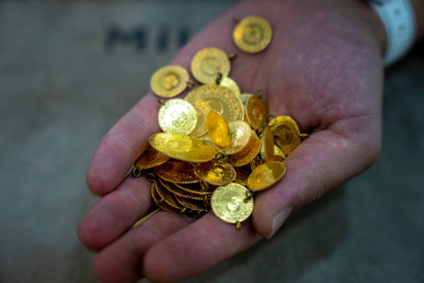 istock Gram gold coins weighed on precision scales 1424026839