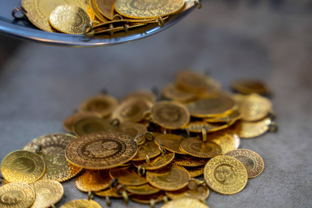 Gold coin in treasure old pot on black background