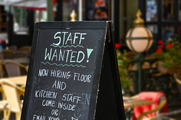 istock Staff wanted sign outside a restaurant 1424028283