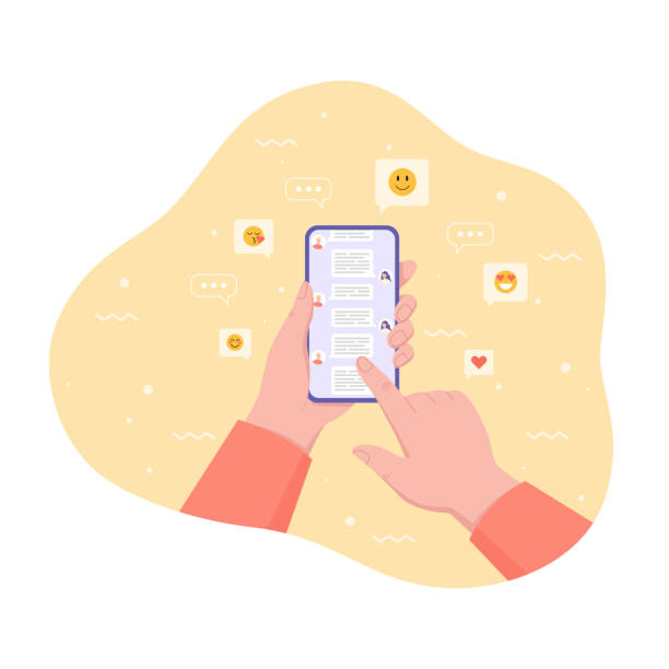 istock Hands holding phone with short messages, icons and emoticons. Speech bubbles on smartphone screen 1424028351