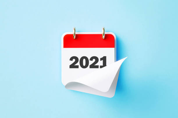 istock 2021 Written Red Calendar On Blue Background 1424030470