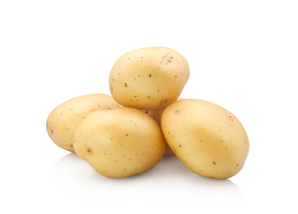 istock Fresh whole potatoes isolated on white 1424030533