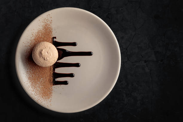 istock Macaroon with chocolate sauce and cocoa powder. 1424032240