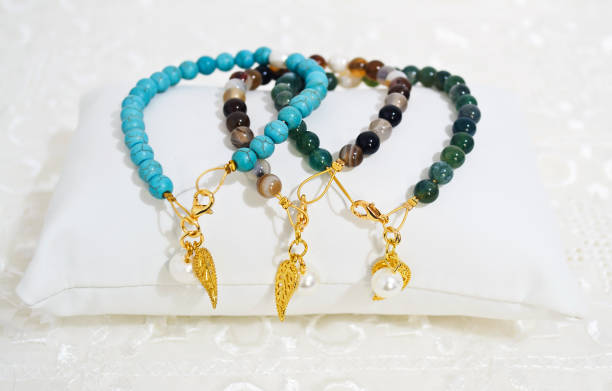 gemstone bracelets - turquoise and agate semi precious stones stock photo