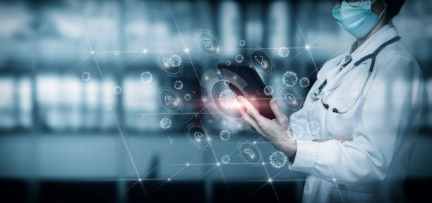 istock Medical worker a mobile device fights the spread of viruses. 1424036665