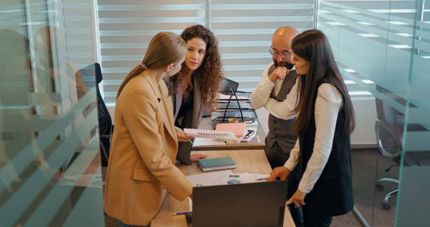 istock Motivated business people working on future ideas. 1424043391