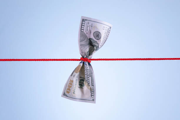 istock One Hundred Dollar Banknote Tied Up 1424045181
