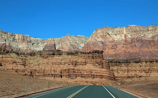 istock Road and red Vermilion Cliffs 1424048566