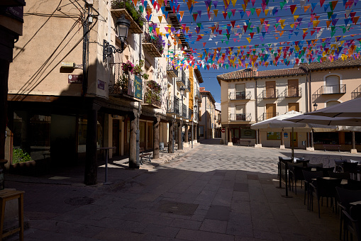 San Esteban de Gormaz (Spain), September 5, 2022. It is square in shape and is made up of a set of arcaded buildings. There is the Town Hall. It is a town in the province of Soria with 3054 inhabitants having. The town has been declared a Historic-Artistic Site.