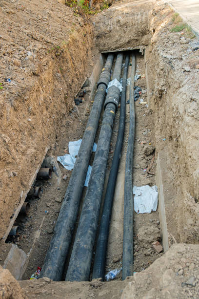 istock Replacement of old pipes with new ones in the pit 1424049071