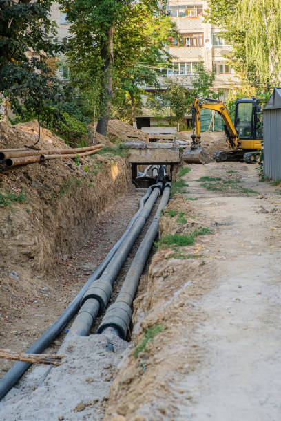 istock Replacement of old pipes with new ones in the pit 1424049135