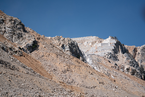 Ledges of abandoned marble quarry in a daytime