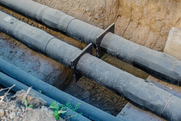 istock Replacement of old pipes with new ones in the pit 1424052582